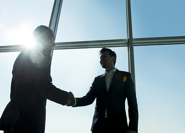 Business men discussing insurance